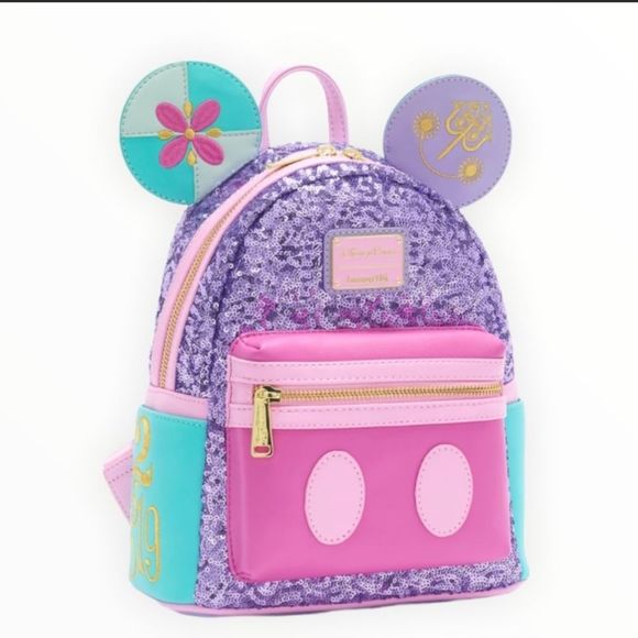 Loungefly Handbags - Loungefly Disney Parks Main attraction it’s a small world mini backpack